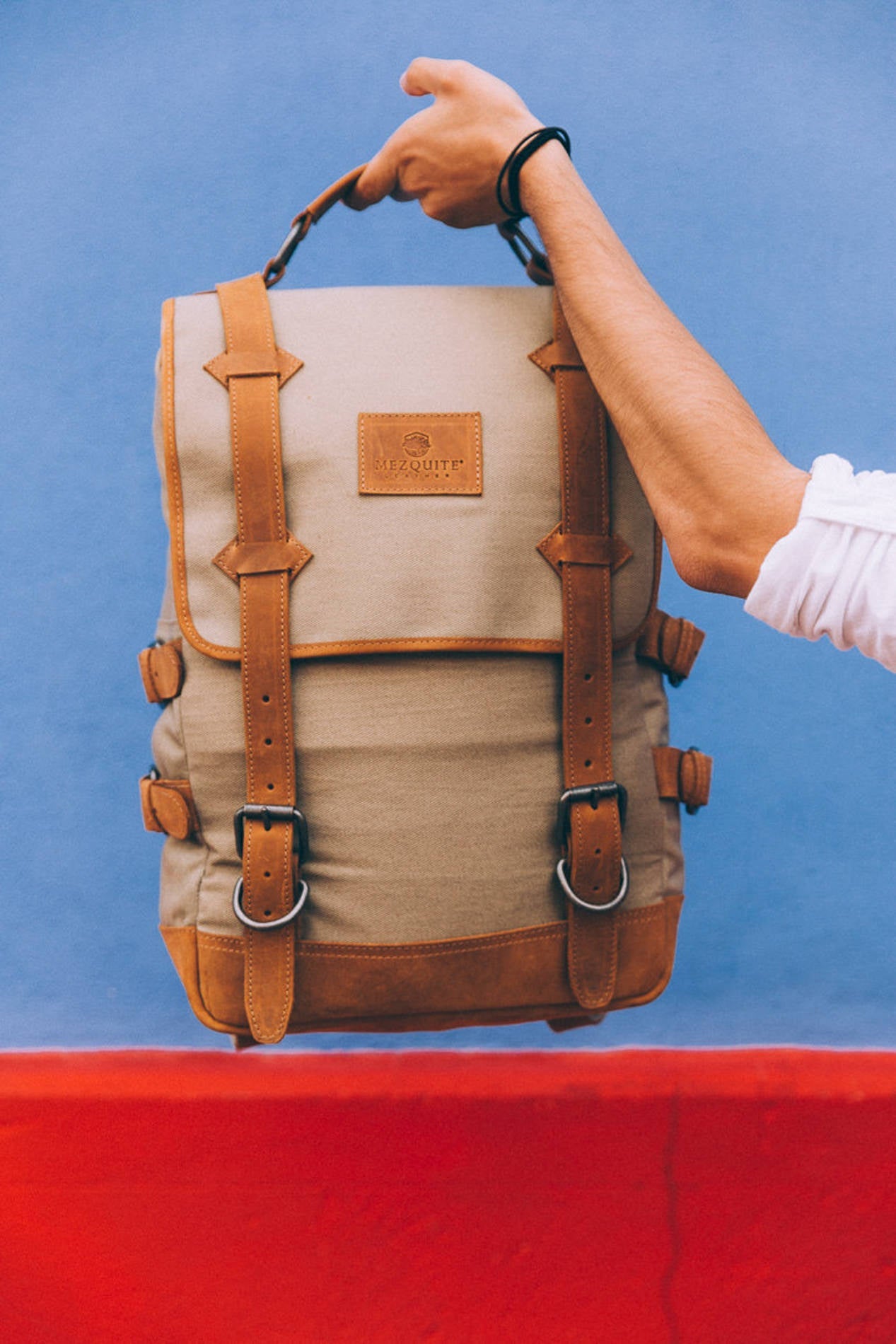 Handmade leather and fabric backpack from Mezquite Leather, durable travel and everyday bag crafted in Mexico with sustainable materials and timeless design.
