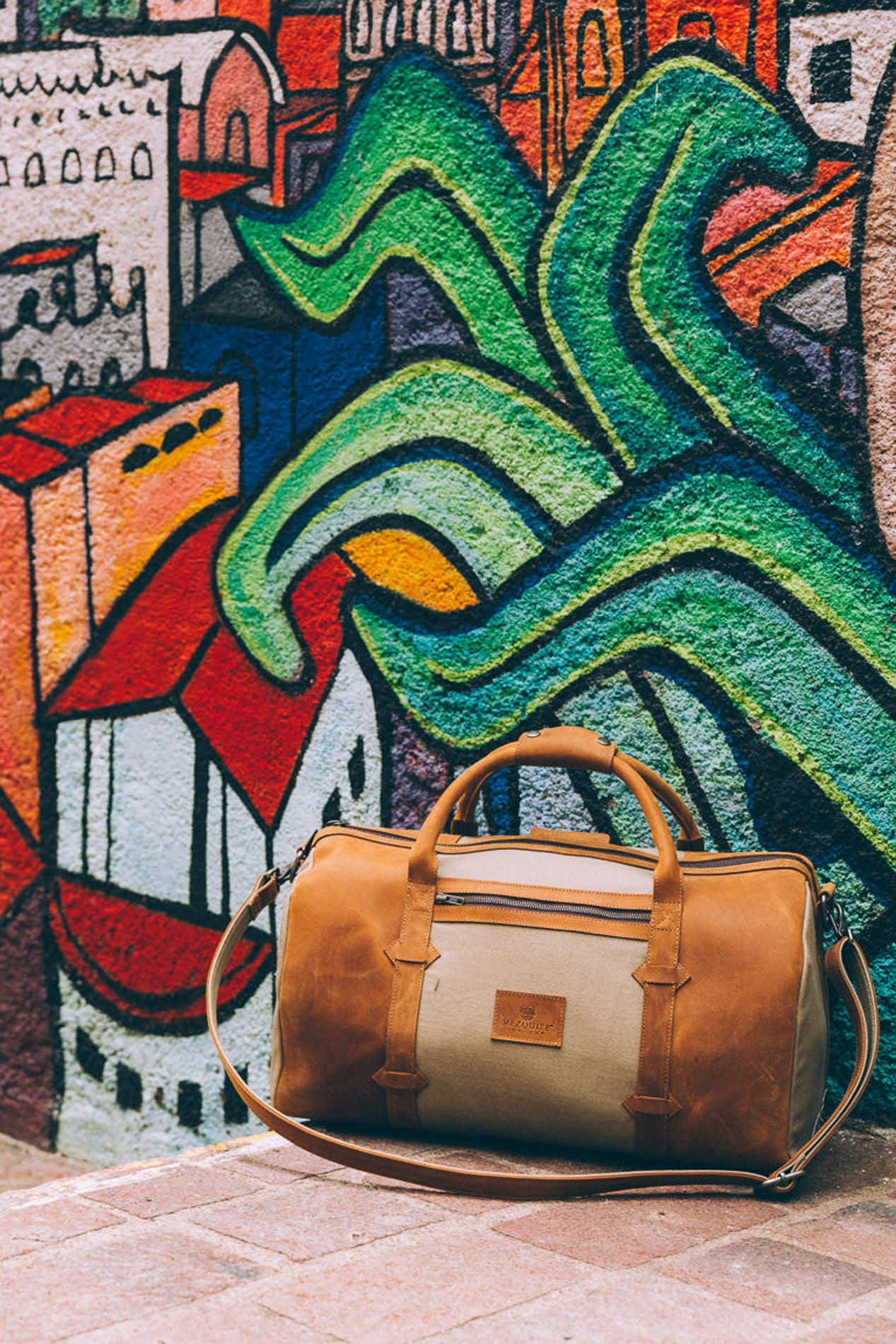 TAMARACK leather duffle bag by Mezquite Leather — handcrafted travel bag inspired by the tamarack tree, symbol of endurance and heritage.