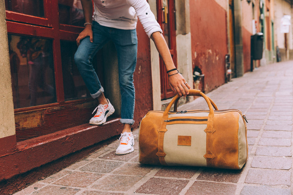 TAMARACK leather duffle bag by Mezquite Leather — handcrafted travel bag inspired by the tamarack tree, symbol of endurance and heritage.