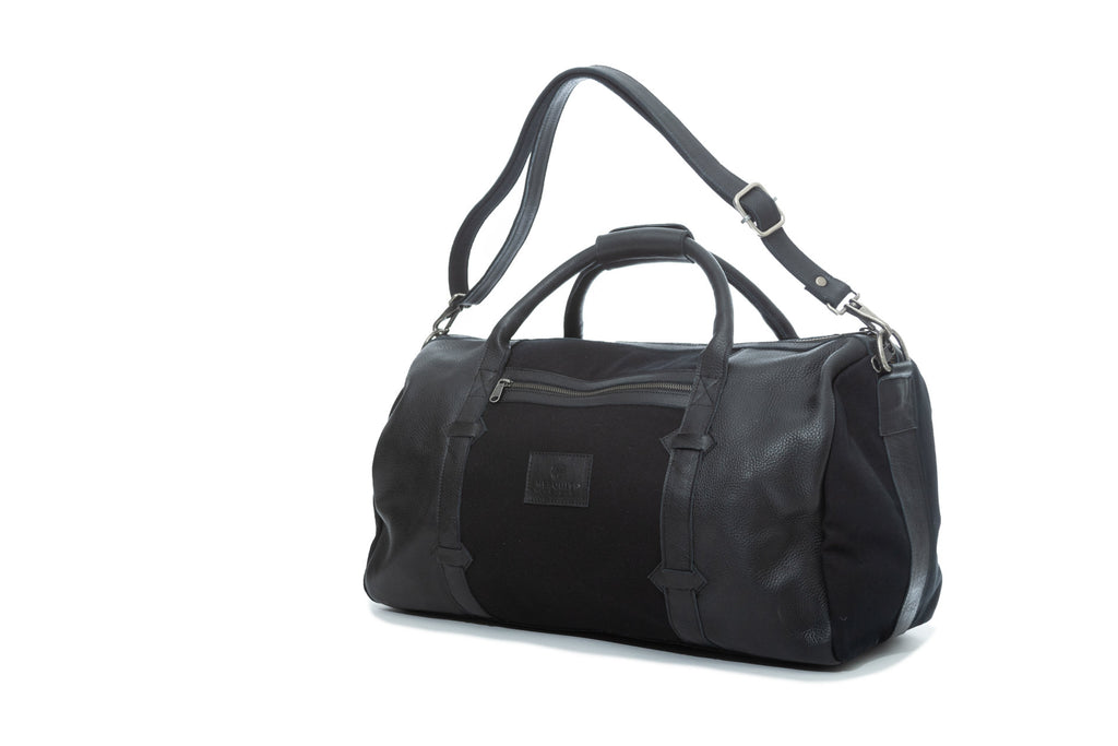 TAMARACK leather duffle bag by Mezquite Leather — handcrafted travel bag inspired by the tamarack tree, symbol of endurance and heritage.