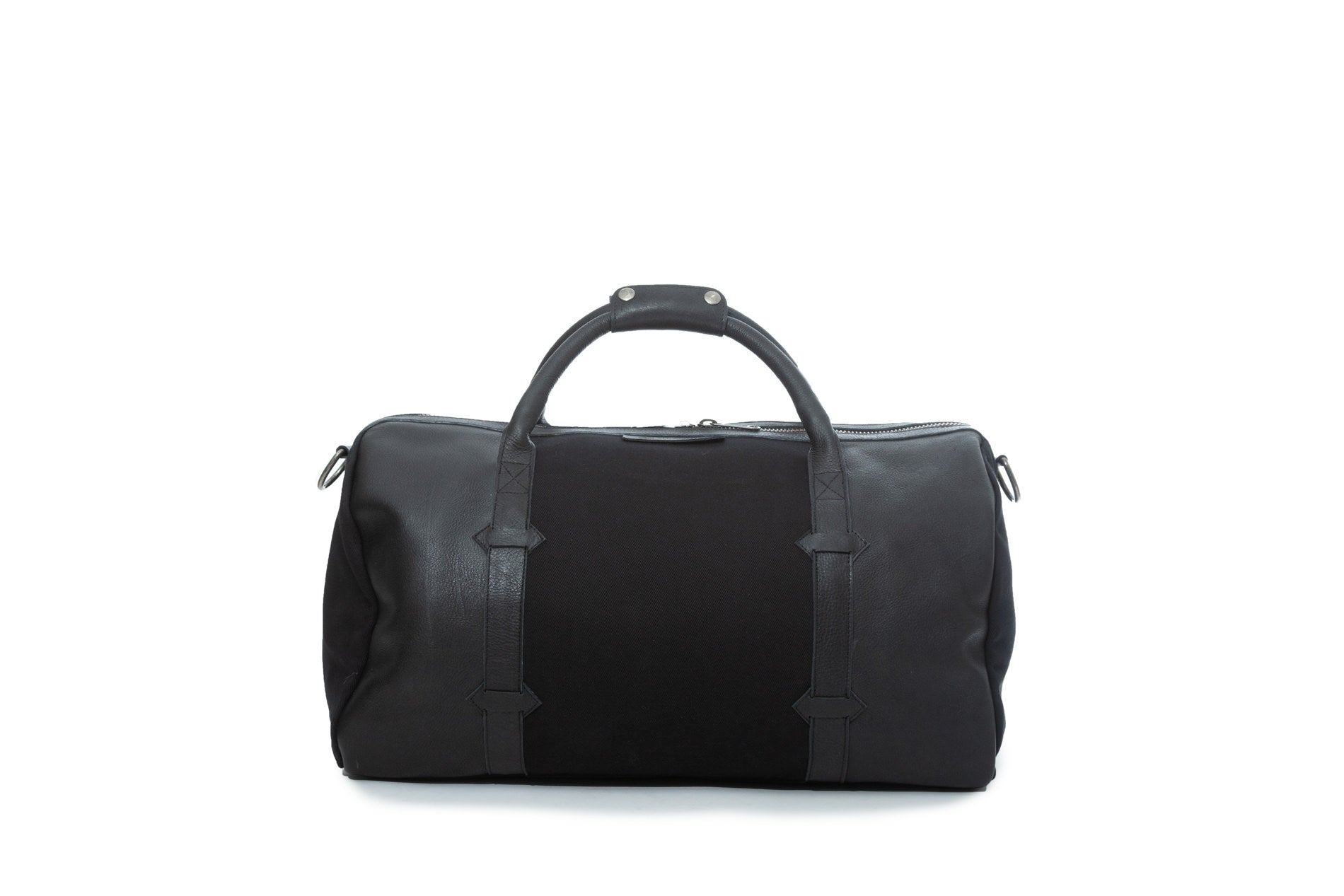 TAMARACK leather duffle bag by Mezquite Leather  handcrafted travel bag inspired by the tamarack tree, symbol of endurance and heritage.