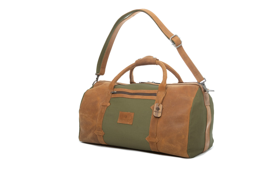 TAMARACK leather duffle bag by Mezquite Leather  handcrafted travel bag inspired by the tamarack tree, symbol of endurance and heritage.